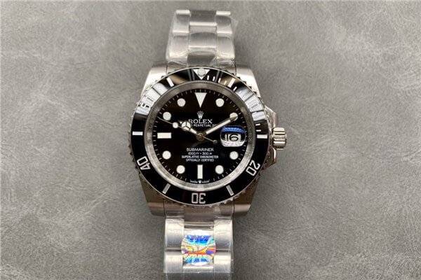 A budget-friendly AAA replica watch next to a a measuring tape showing some inaccuracies