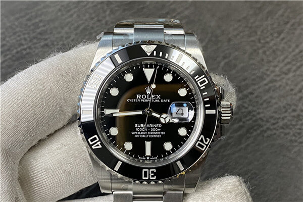 A classic black Rolex Submariner watch displayed prominently