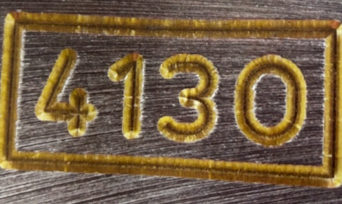 Close-up of Rolex movement engravings