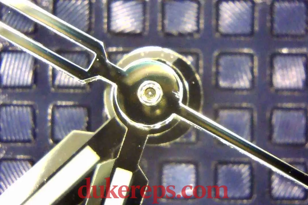 A macro shot of the VSF AP 15500 blue dial showing the hand polishing