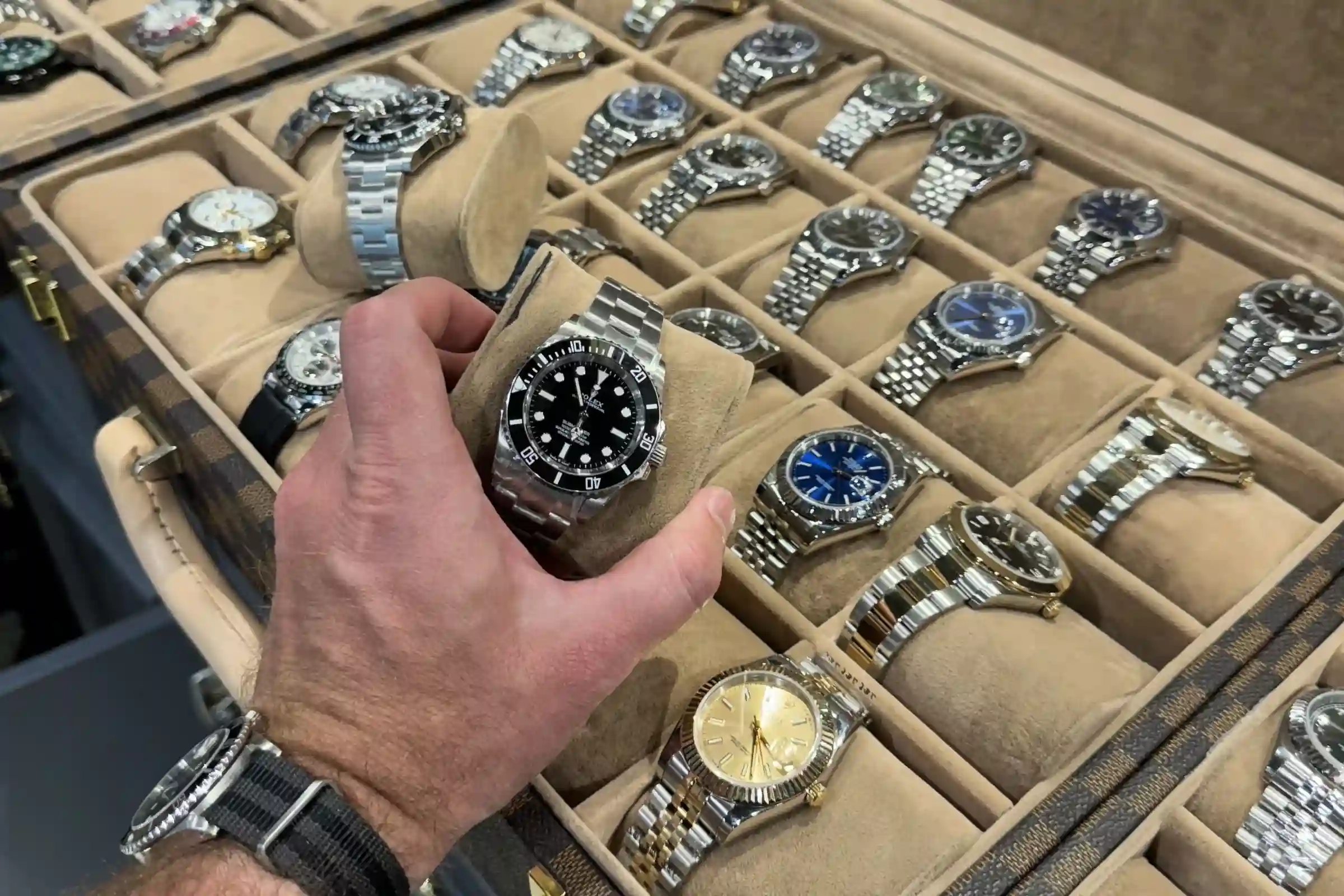 A collection of high-quality Rolex replica watches on a table